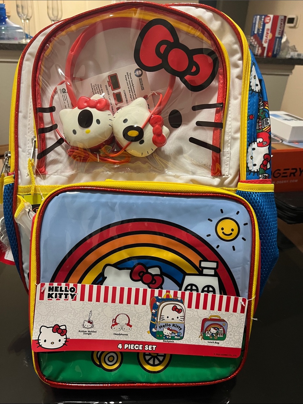 Hello Kitty Rainbow Backpack and Headphones – Blue, Yellow, Red, Green